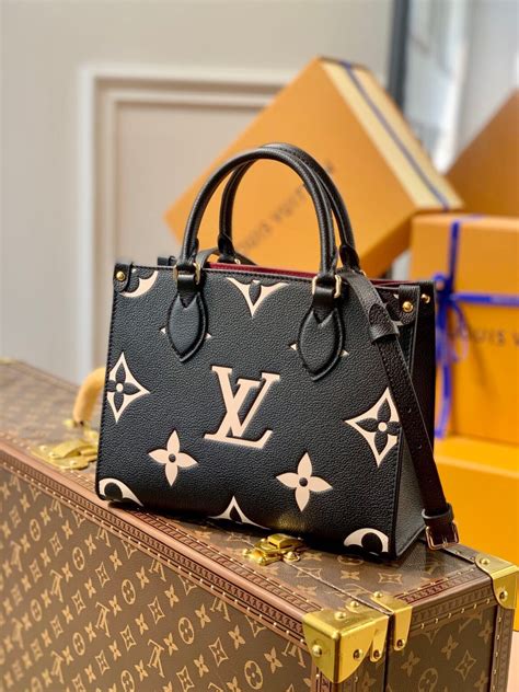 louis vuitton black bag gold